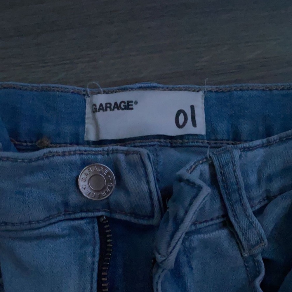 light blue ripped garage jeans size 1